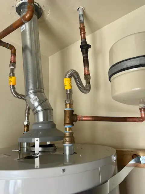 Water heater installation and plumbing repair in Coolidge Corner